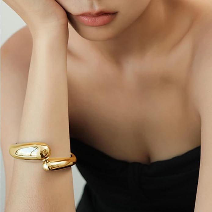 Golden Polished Chunky Twisted Hinged Waterdrop Bangle Bracelet for Women Spiraled Oval Bangle Bracelet