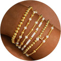 Turandoss 6PCS Beaded Initial Bracelets for Women Girls Valentines Day Gifts - 18K Gold Plated Beaded Initial Letter Bracelet Initial A-Z Stretch Bead Stackable Bracelet Valentines Day Gifts for Her