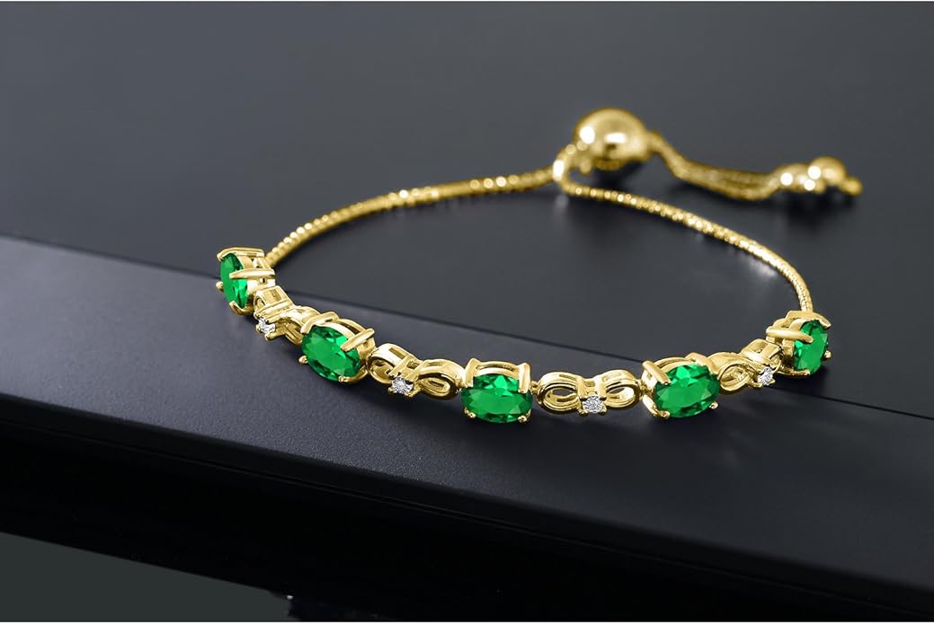 Gem Stone King 7X5MM Oval Cut Gemstone Birthstone and Accent Lab Grown Diamond Tennis Bracelet For Women In 18K Yellow Gold Plated Silver | Adjustable Bolo Bracelet For Women | Easy-On Easy-Off