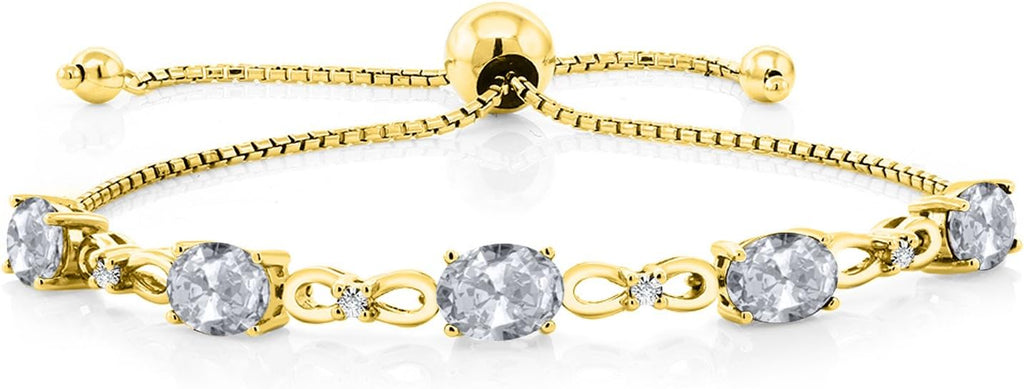 Gem Stone King 7X5MM Oval Cut Gemstone Birthstone and Accent Lab Grown Diamond Tennis Bracelet For Women In 18K Yellow Gold Plated Silver | Adjustable Bolo Bracelet For Women | Easy-On Easy-Off