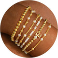 Turandoss 6PCS Beaded Initial Bracelets for Women Girls Valentines Day Gifts - 18K Gold Plated Beaded Initial Letter Bracelet Initial A-Z Stretch Bead Stackable Bracelet Valentines Day Gifts for Her