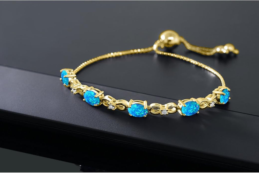 Gem Stone King 7X5MM Oval Cut Gemstone Birthstone and Accent Lab Grown Diamond Tennis Bracelet For Women In 18K Yellow Gold Plated Silver | Adjustable Bolo Bracelet For Women | Easy-On Easy-Off