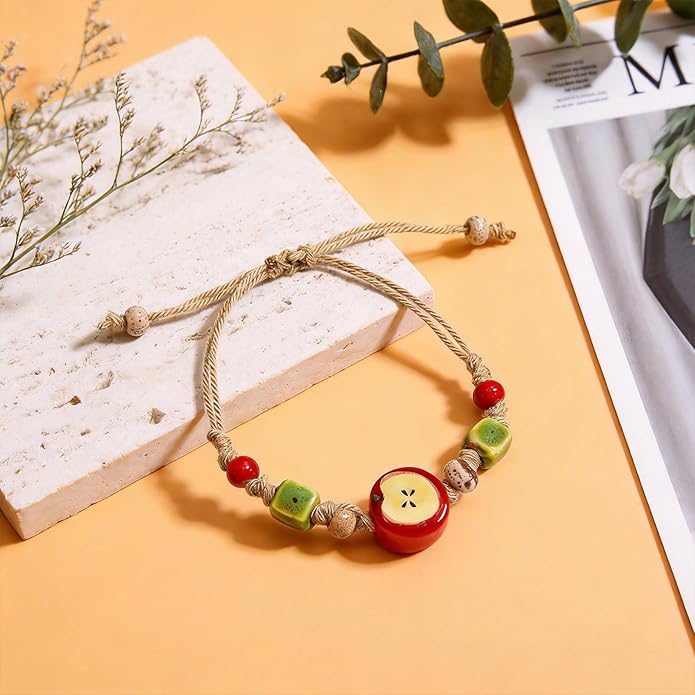 Handmade Ceramic Apple Charm Bracelet, Woven Rope String Wristband with Red Fruit Porcelain Beads, Adjustable Artisan Jewelry for Women, Nature-Inspired Accessory, Unique Teacher Appreciation Gifts