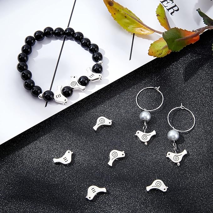 NBEADS 60 Pcs Bird Shape Loose Alloy Beads, Tibetan Style Metal Spacer & Animal Charm Beads With Container for Bracelet, Necklace, Earrings - Antique Silver